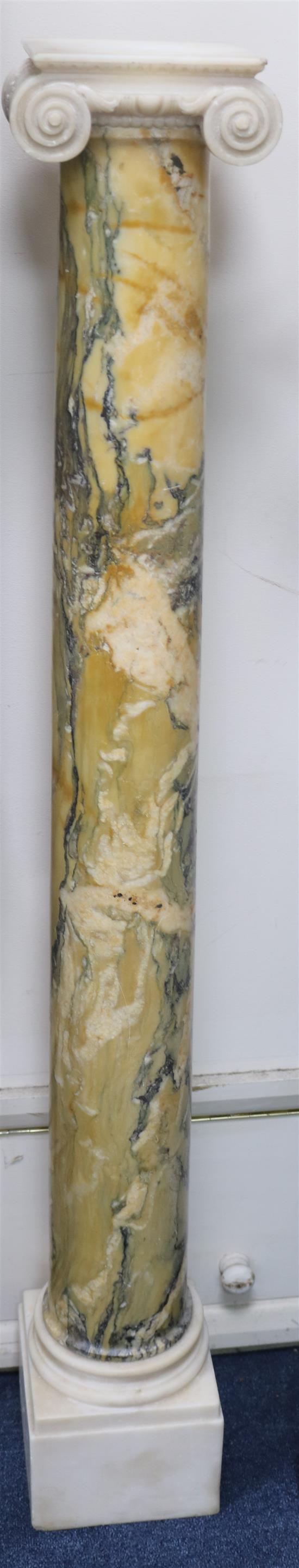 A pair of Giallo Antico marble Ionic columns, H.4ft 2in.